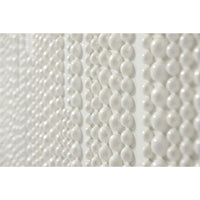 Close-up of bead texture on white cabinet surface.