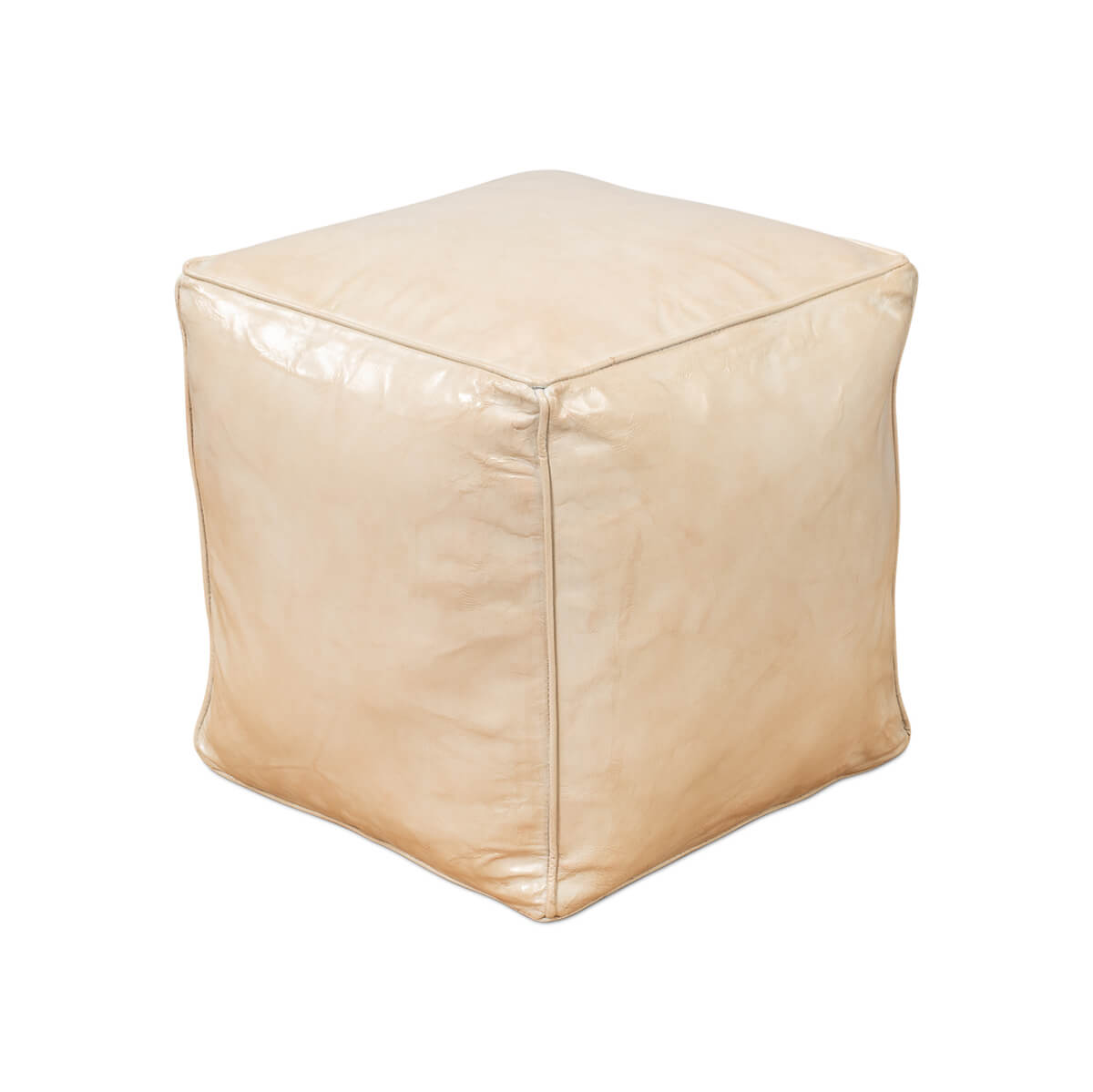 Beige leather cube stool, side angle perspective.
