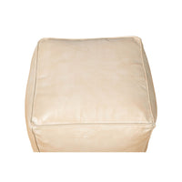 Beige leather cube stool, top-down view.
