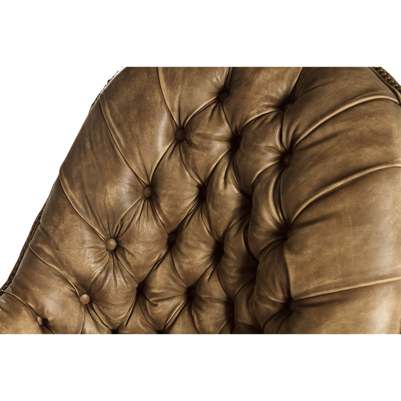 Close-up of tufted detail on chair back.