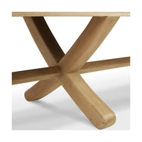 X-shaped wooden base detail of minimalist bench.