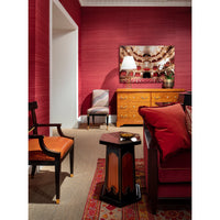 Biedermeier dresser in living room with red walls.