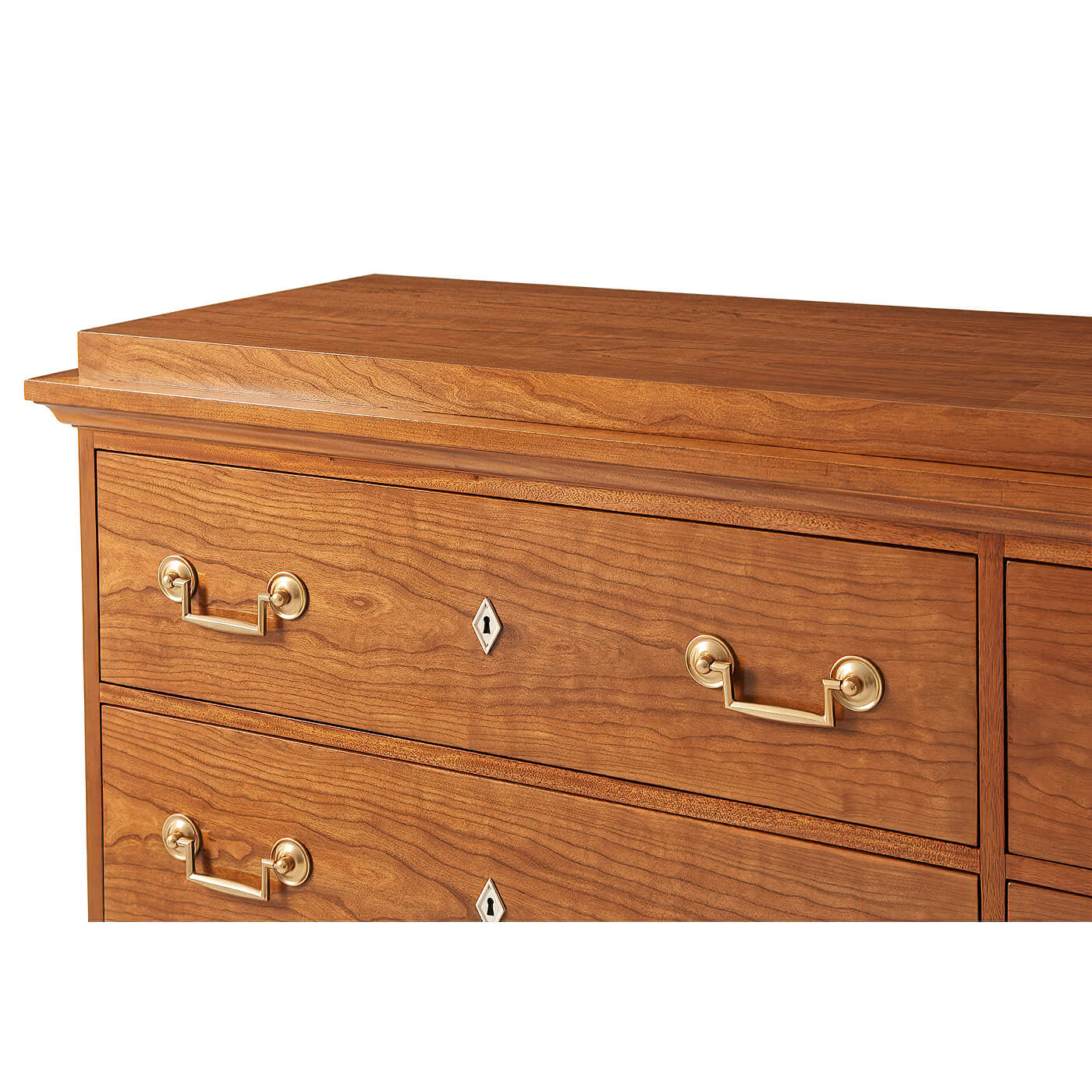 Top section of Biedermeier dresser showing wood grain.