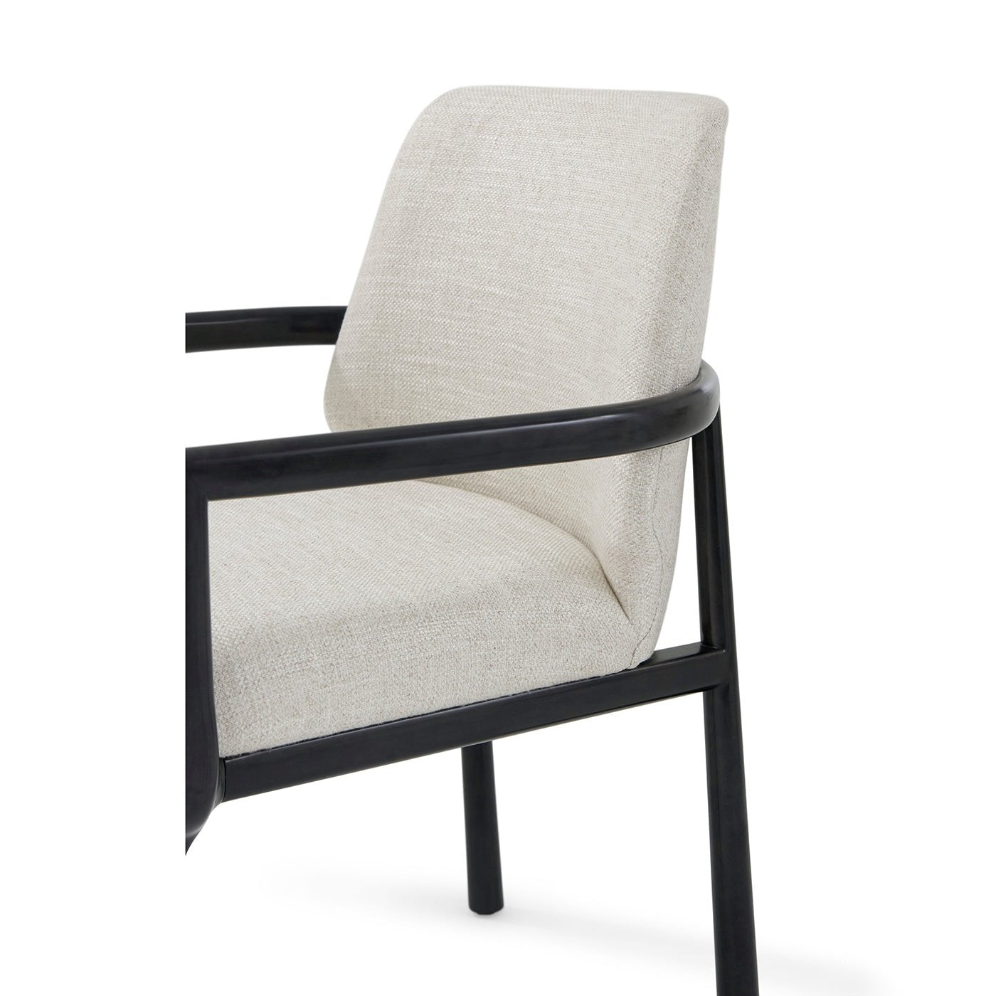 Black dining armchair, close-up, beige fabric and frame.