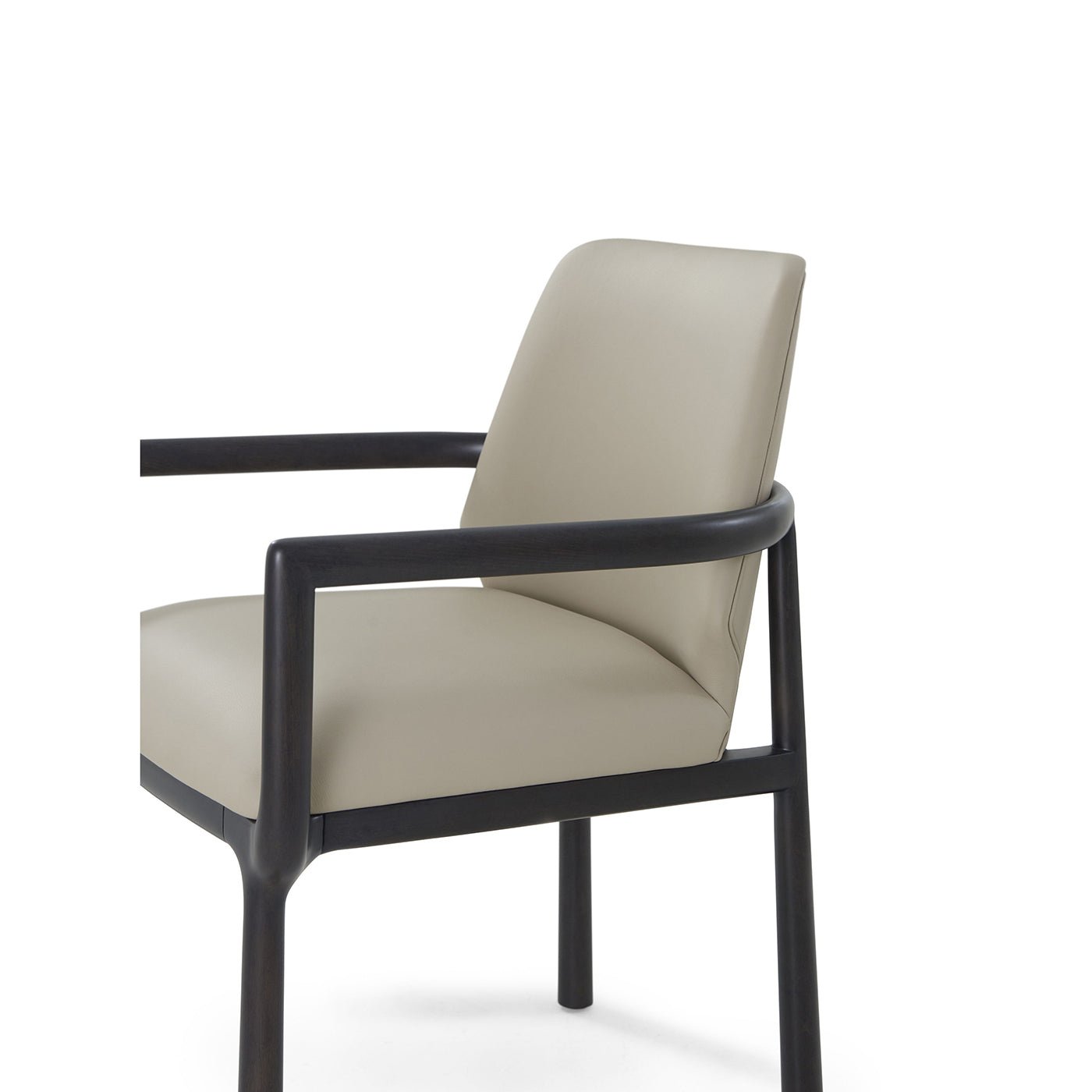 Close-up of Art Deco armchair side, leather detail.