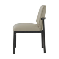 Beige dining chair, side profile with black legs.