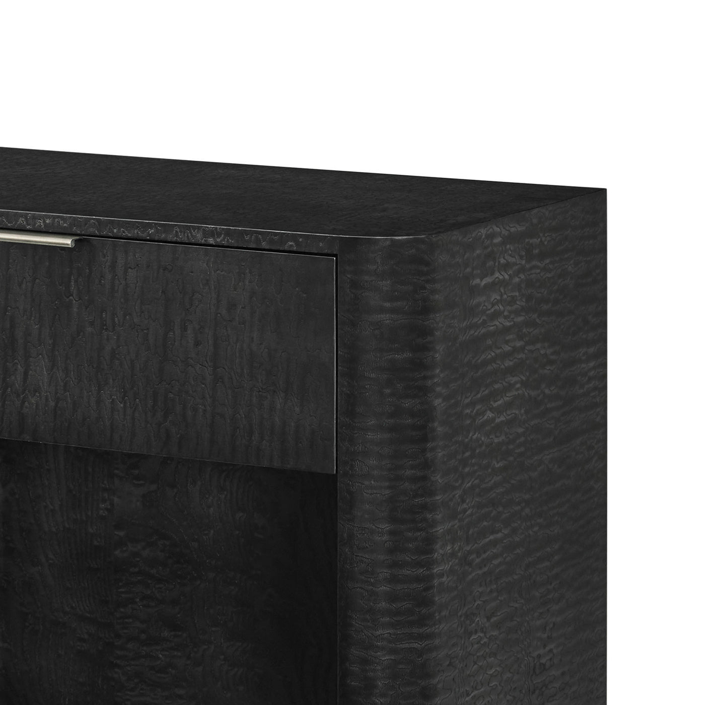 Close-up of black art deco nightstand corner detail.