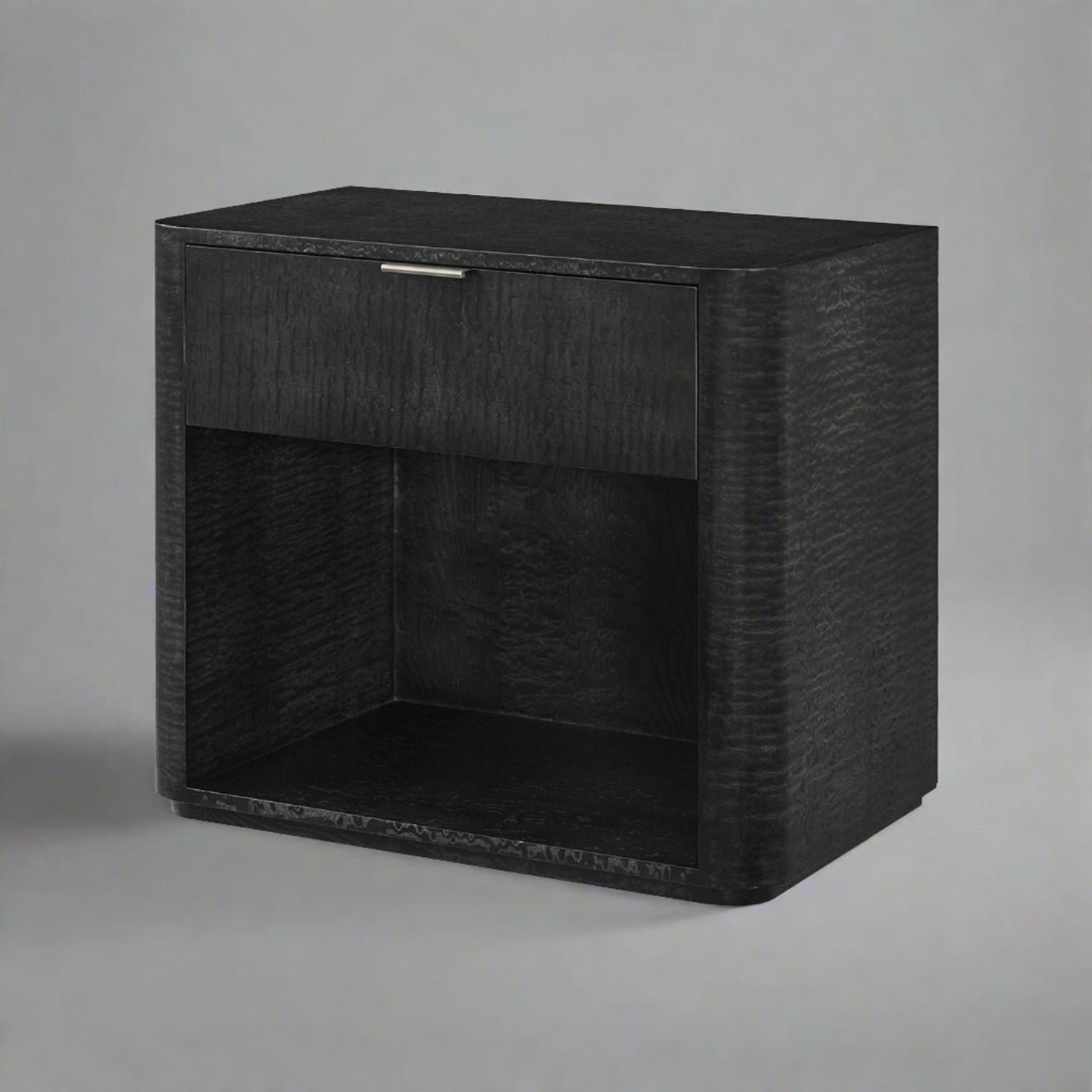 Black art deco nightstand, angled view showing structure.