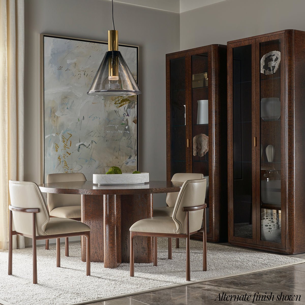 Curio cabinet in dining room with alternate finish