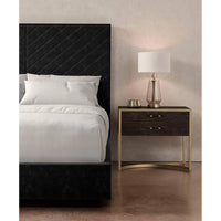 Close-up of headboard and nightstand with lamp.
