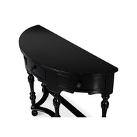 Top view of the black demilune console table.