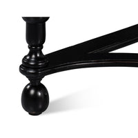 Console table's leg and foot design, close-up view.