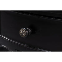 Drawer knob detail on black console table.