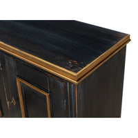 Close-up corner view of black French sideboard.