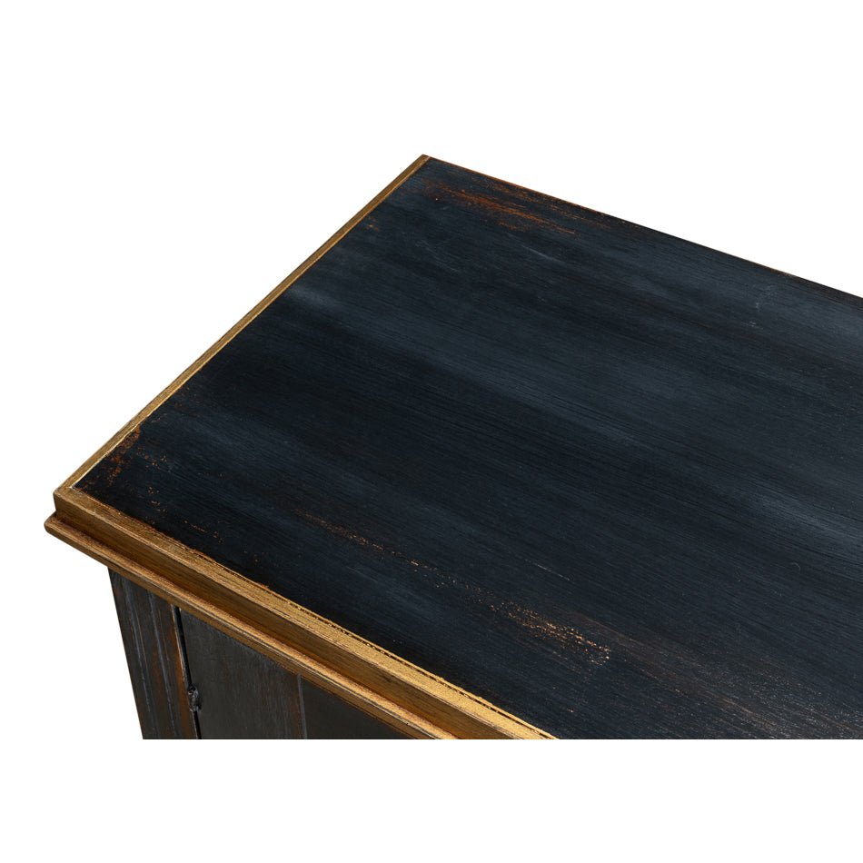 Close-up of black French sideboard wood grain and trim.