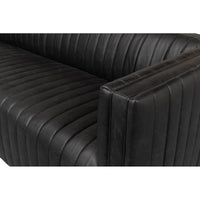 Black leather sofa detailed close-up, armrest and seat.