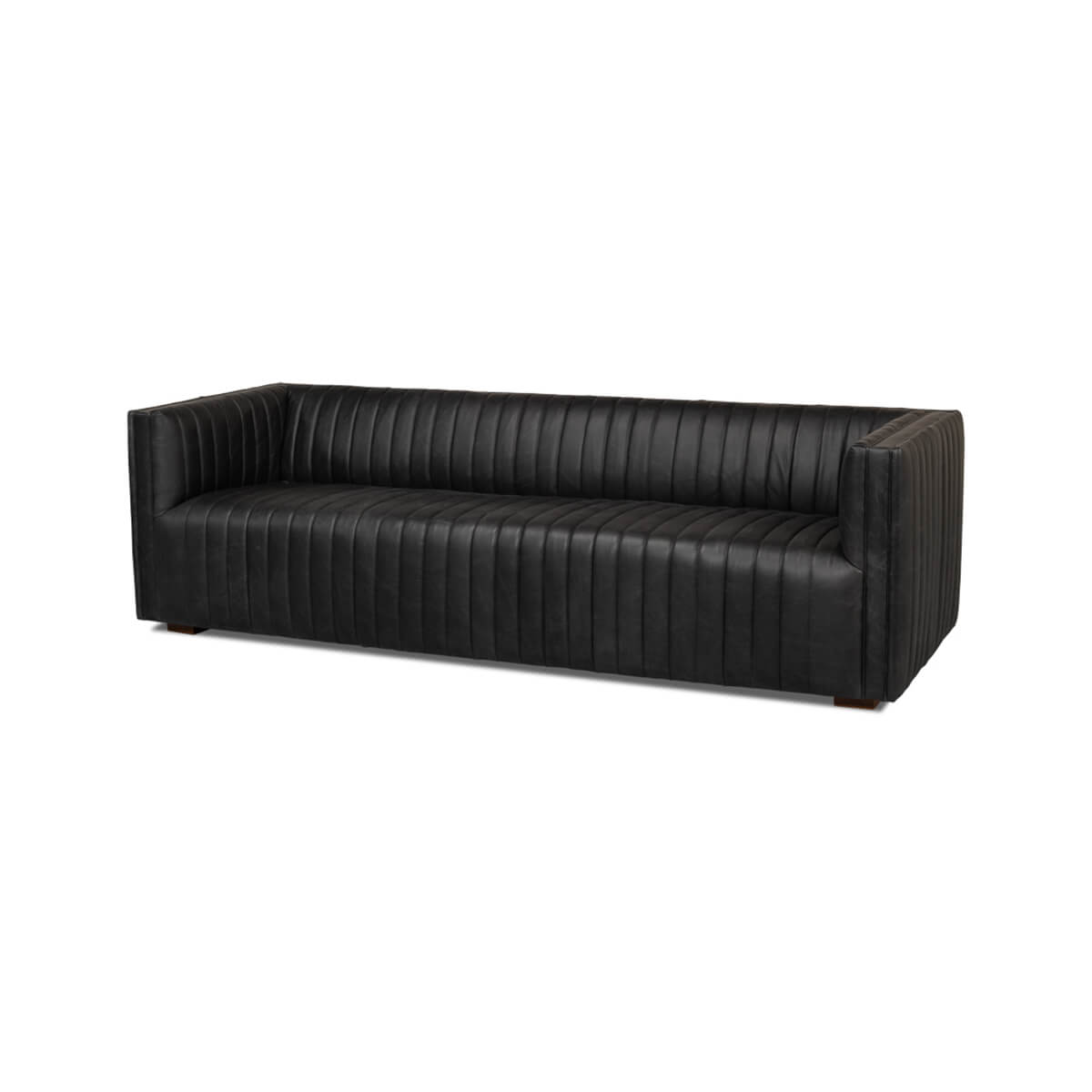 Black leather sofa angle view, mid-century style.