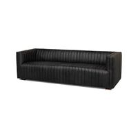 Black leather sofa angle view, mid-century style.