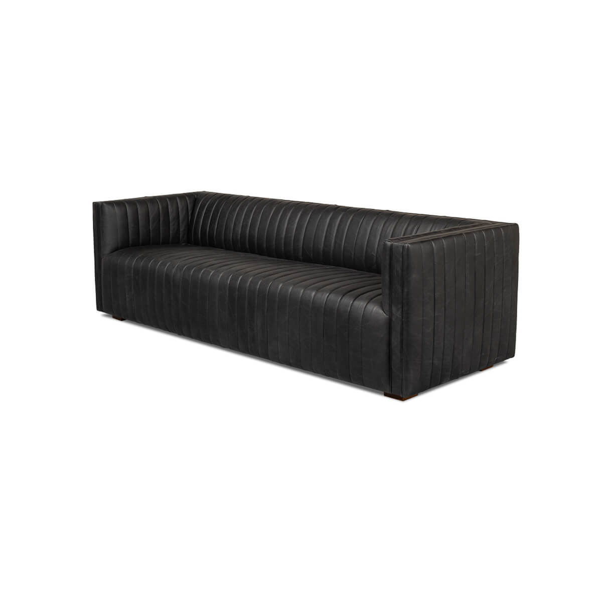 Black leather sofa side angle view, detailed stitching.