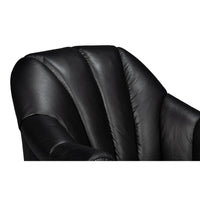 Upholstered back design detail of black swivel chair.