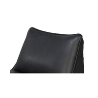 Close-up of chair back cushion on swivel chair.