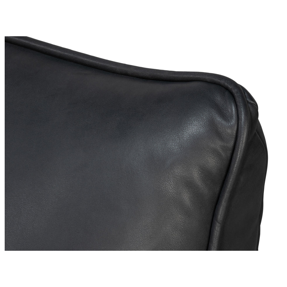 Detail of upper back cushion on slipper chair.