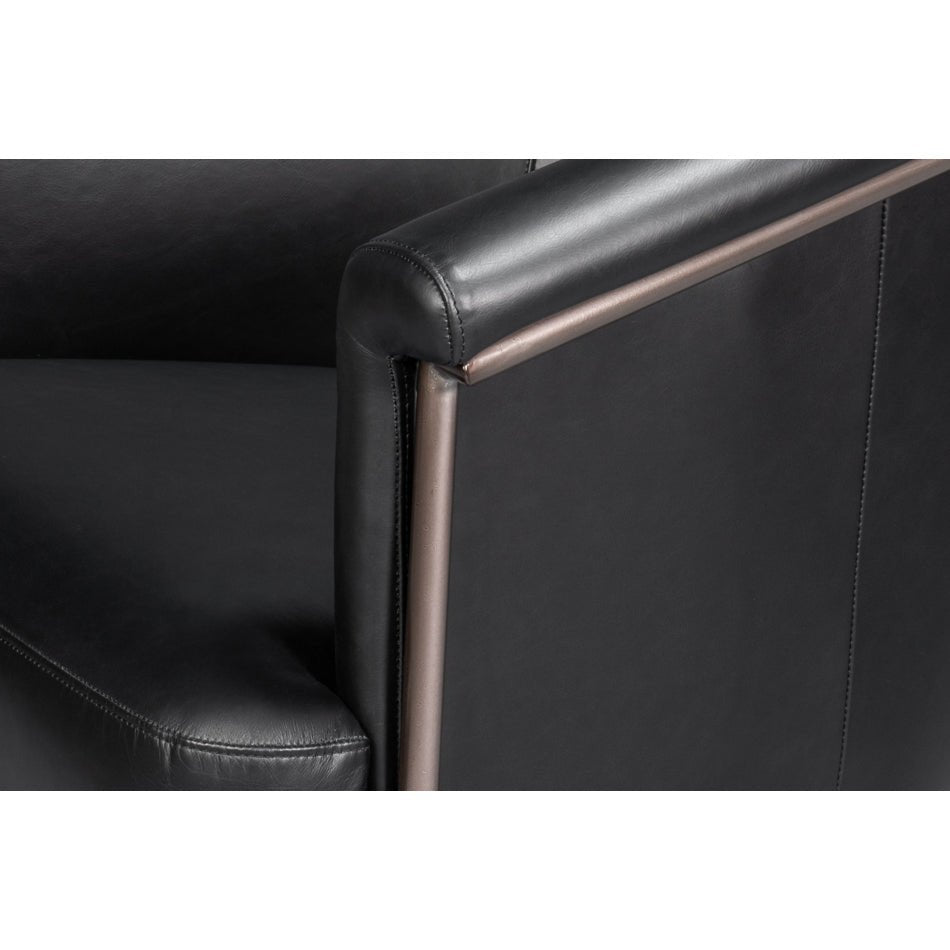 Black leather tub chair arm detail.