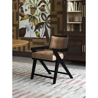 Single Black Mid-Century Armchair in dining room setting.