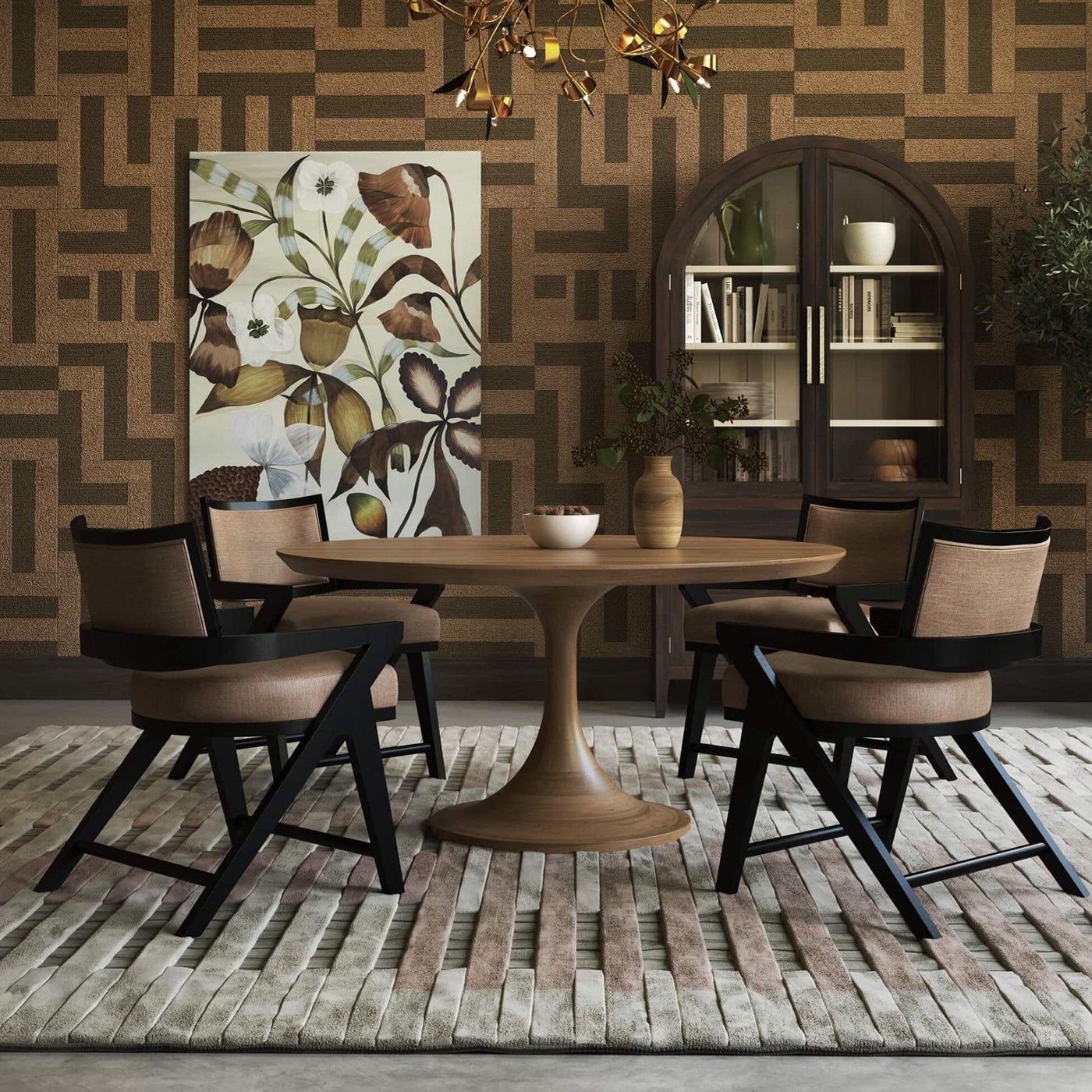 Dining room with armchairs and round table.