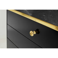 Black mid-century nightstand drawer knob detailed view.