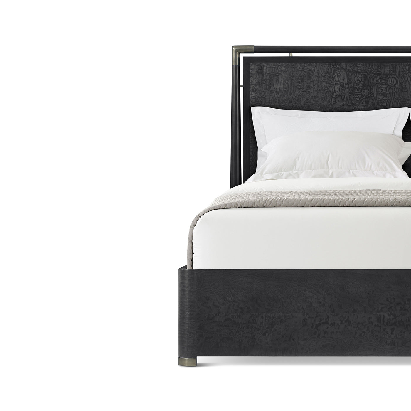 Close-up of black mid-century bed headboard, pillows visible.