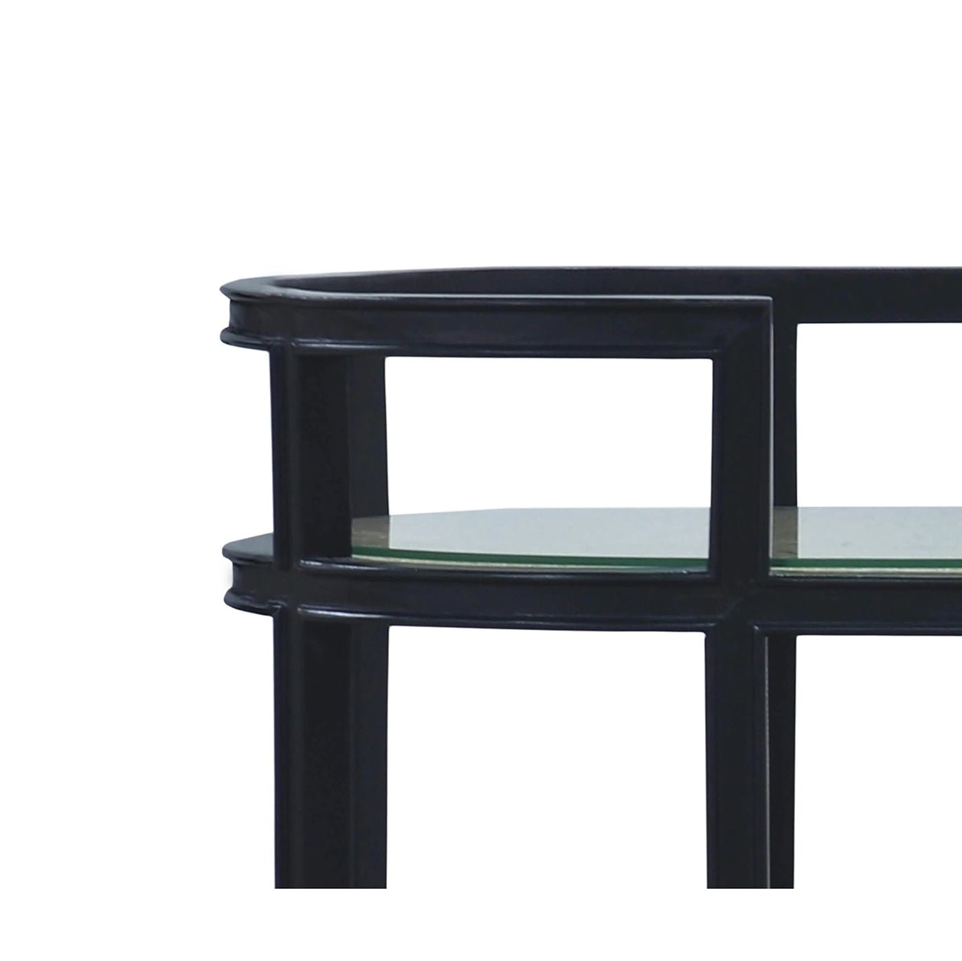 Close-up of bar cart, glass shelf detail, black finish.