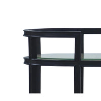Close-up of bar cart, glass shelf detail, black finish.