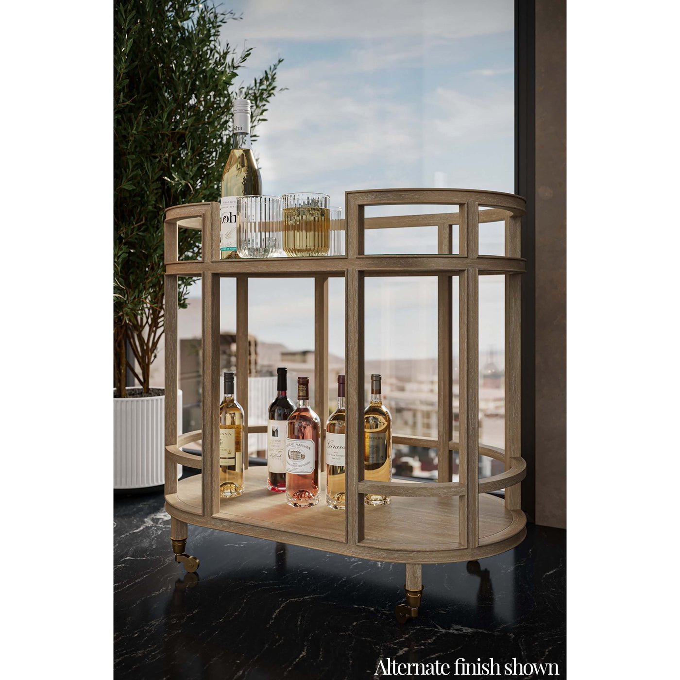 Coastal style bar cart, alternate finish, with wine bottles.