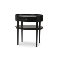 Black oval side table front angled view.