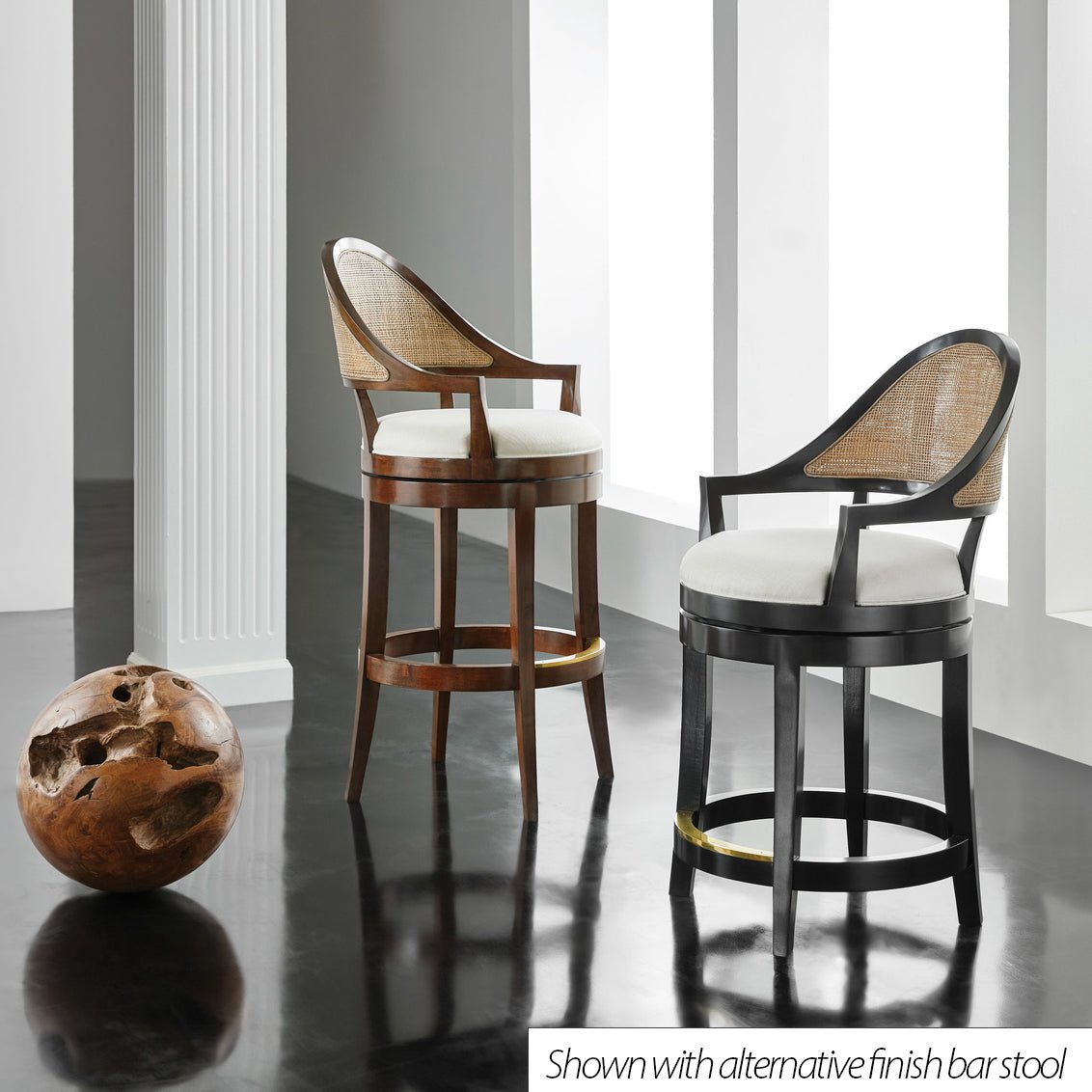 Two counter stools, black and brown, in modern room.