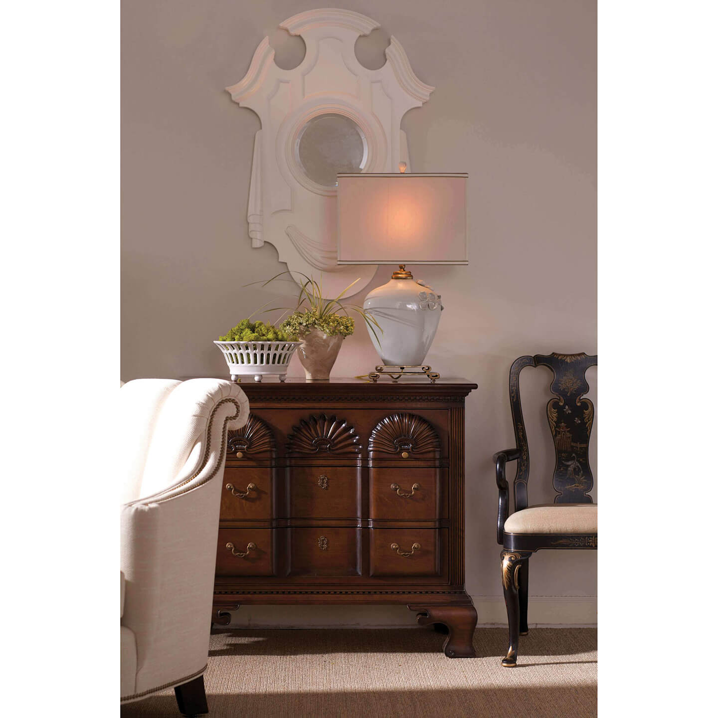 Chest of drawers in elegant living room setting.