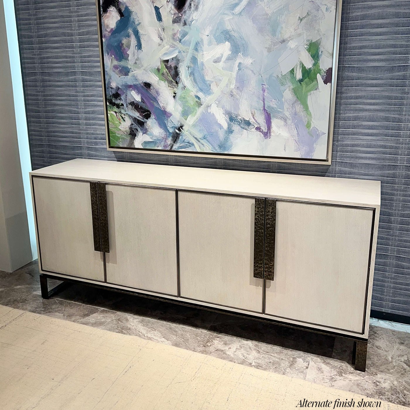Blonde wood industrial media cabinet in a styled room.