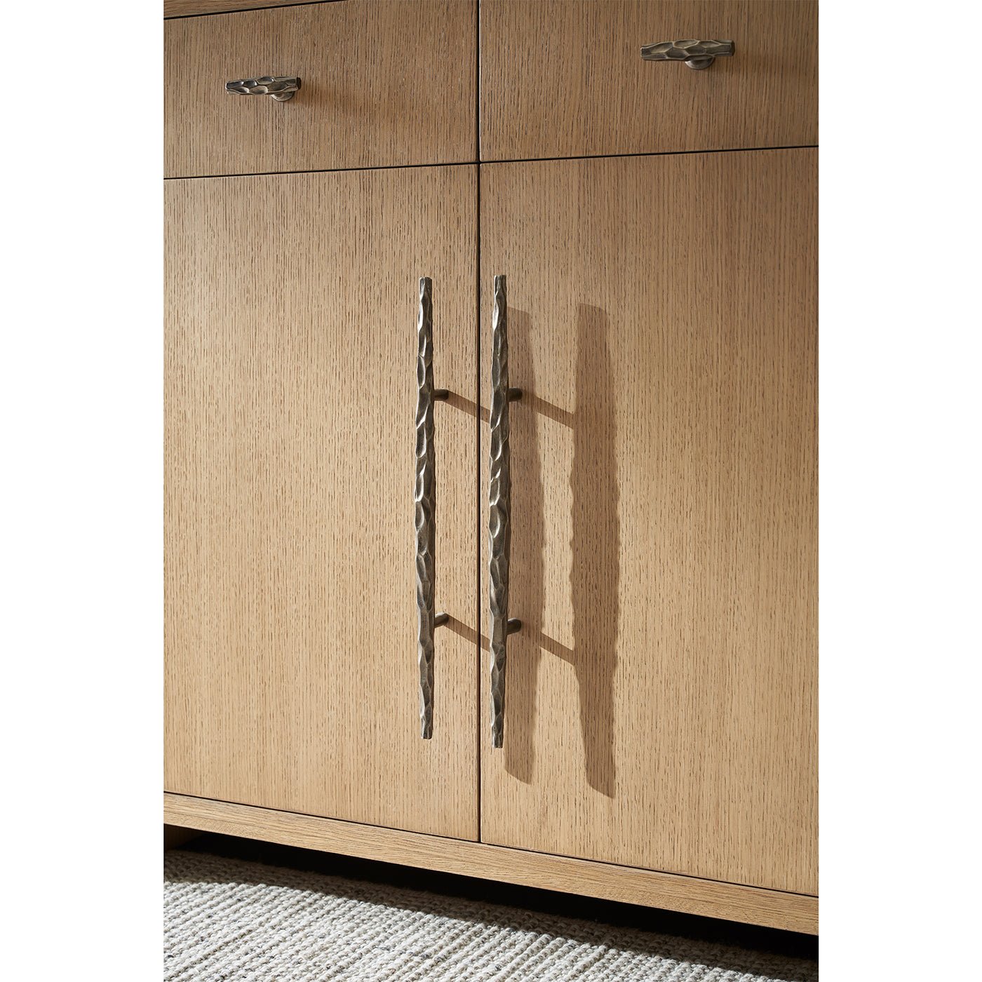 Close-up of buffet sideboard's unique door handles.