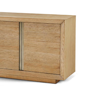 Close-up of cabinet corner showing wood texture details.