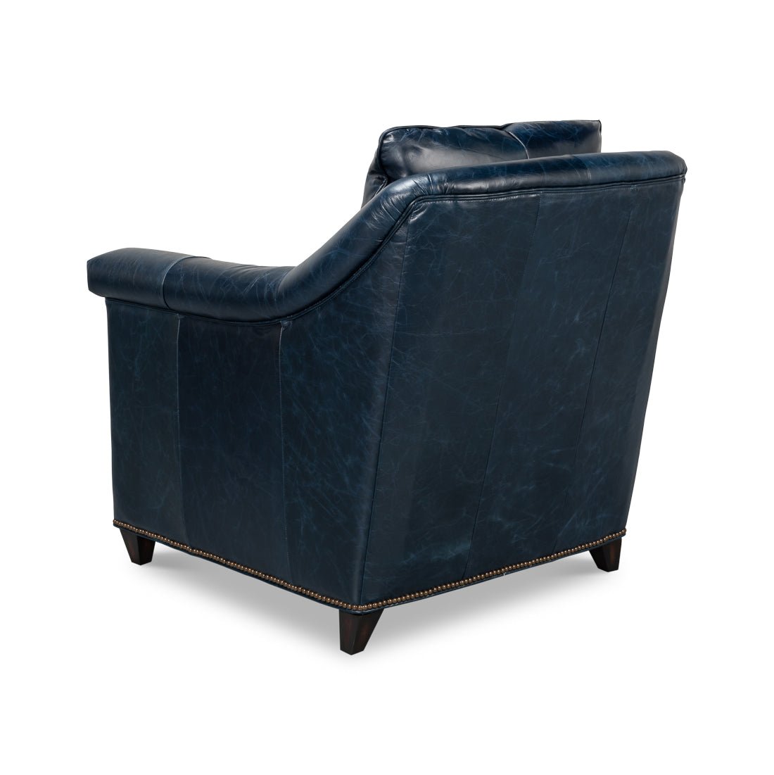 Rear left angle view of blue leather accent chair