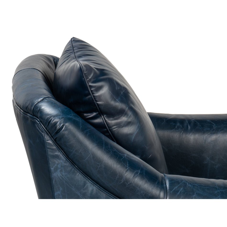 Cushion and armrest of blue leather accent chair