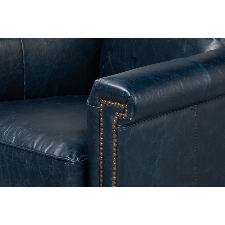 Close-up of chair arm with nailhead trim