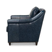 Blue leather accent chair side profile view