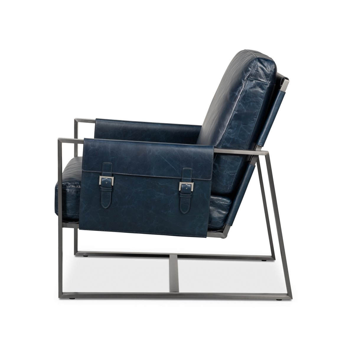 Blue leather accent chair, side view with buckles.