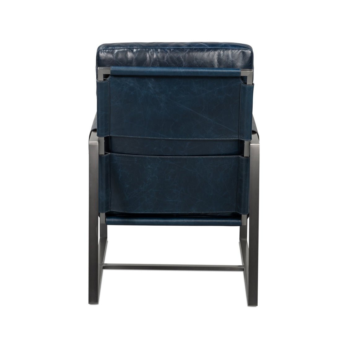 Blue leather accent chair, back view.