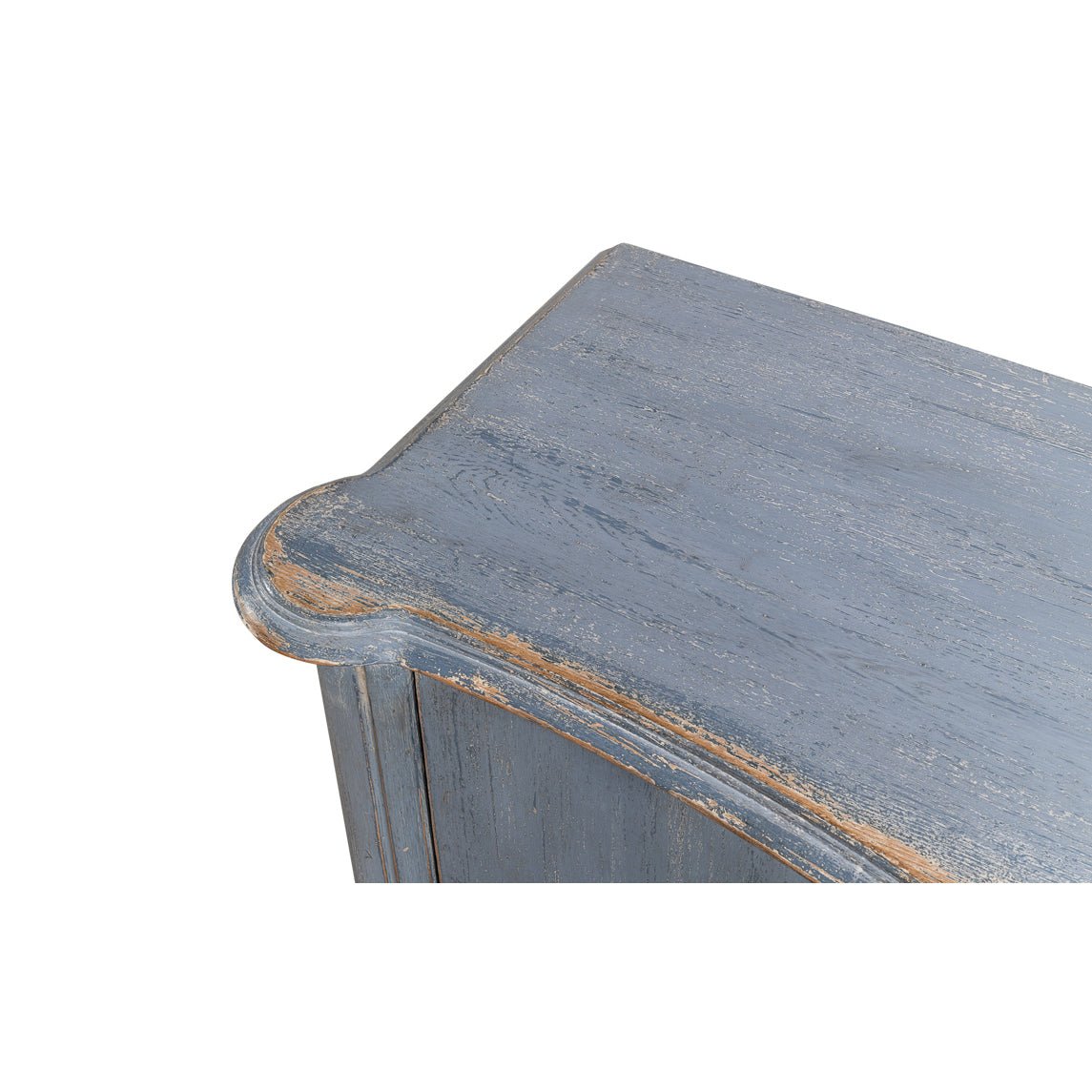 Detailed top surface of blue sideboard.