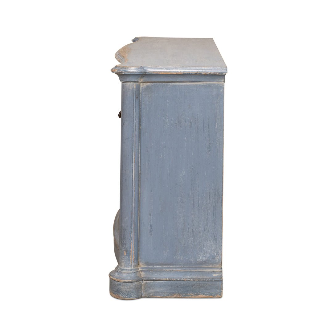 Side profile of blue sideboard.