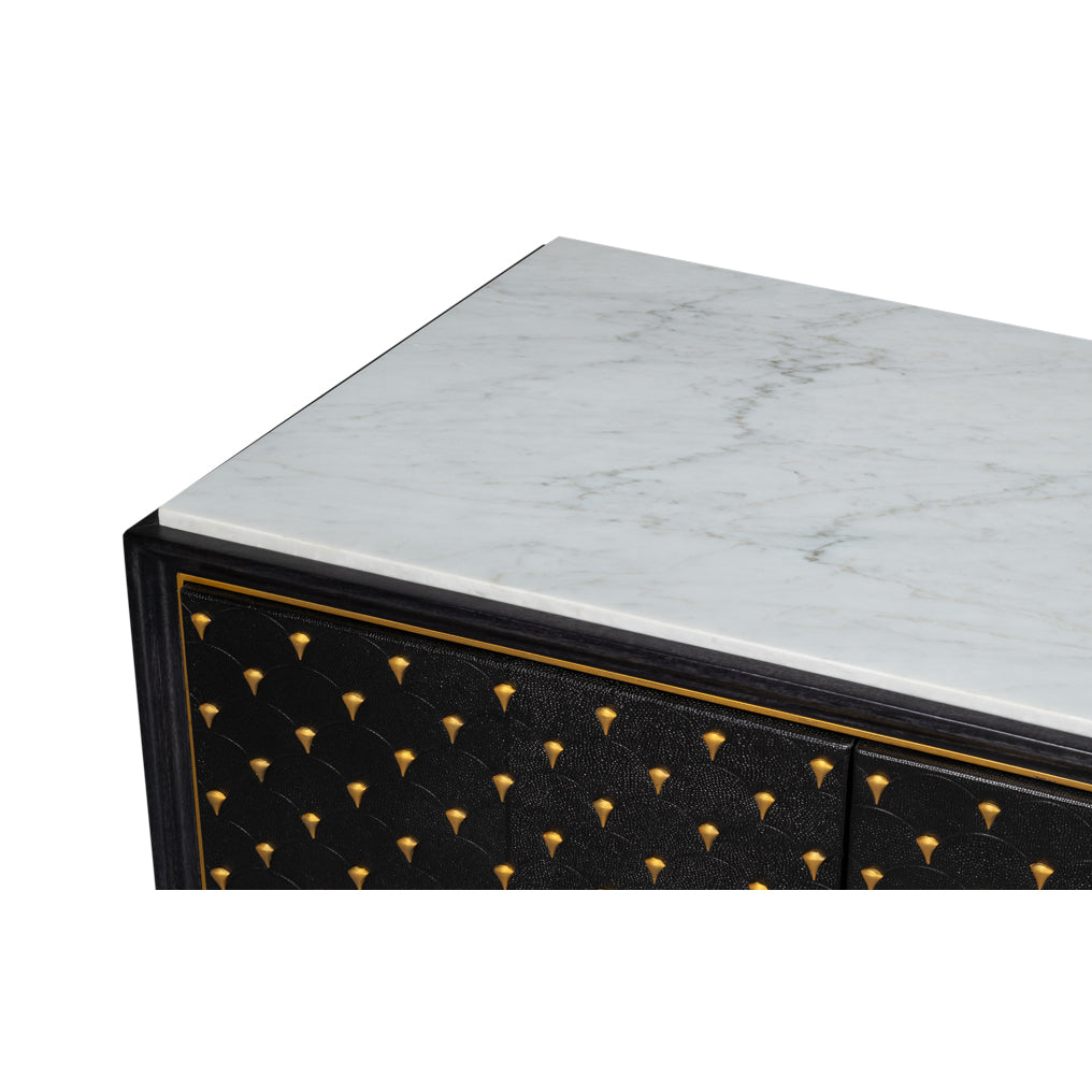 Marble top detail on black sideboard.