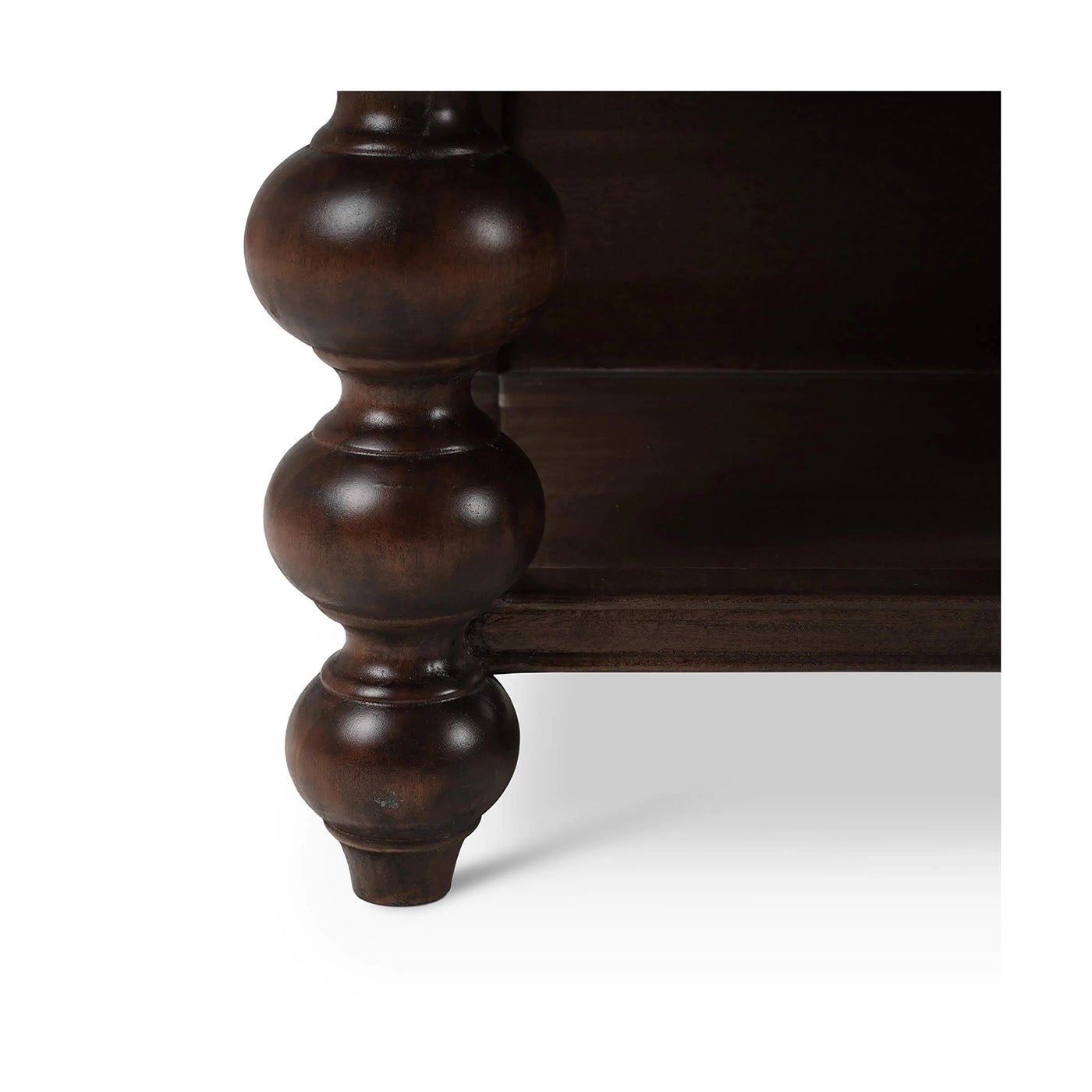 Close-up of kitchen island leg and floor.